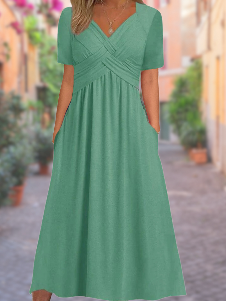 Mireya | Vestido cruzado con cintura ajustada y bolsillos laterales para mujer