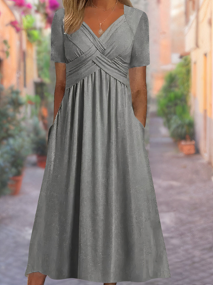 Mireya | Vestido cruzado con cintura ajustada y bolsillos laterales para mujer